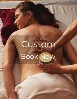 Custom massage therapy with candle treatment at Atha Spa